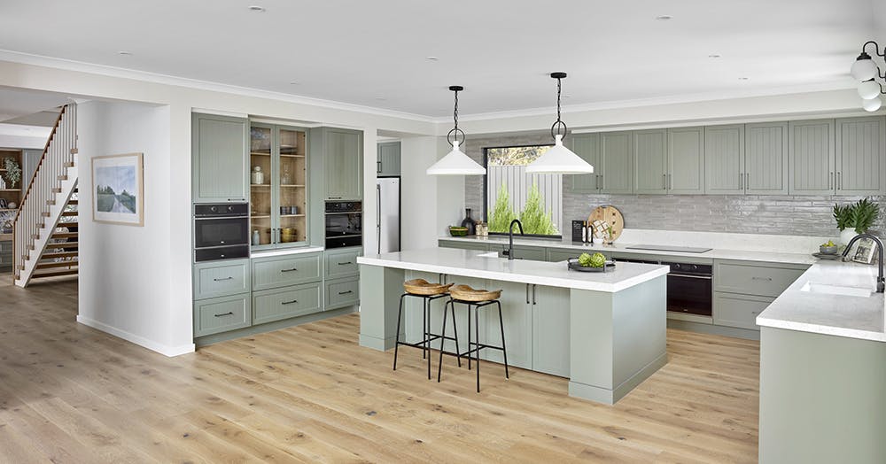 3. The open Hamptons kitchen of the Sovereign 54 in Victoria uses green to make a statement